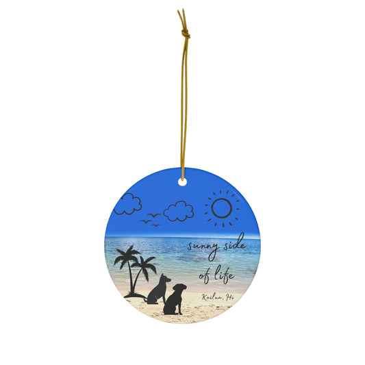Ceramic ornament with Kailua beach scene, palm trees, two dogs and Sunny Side of Life Kailua HI lettering.