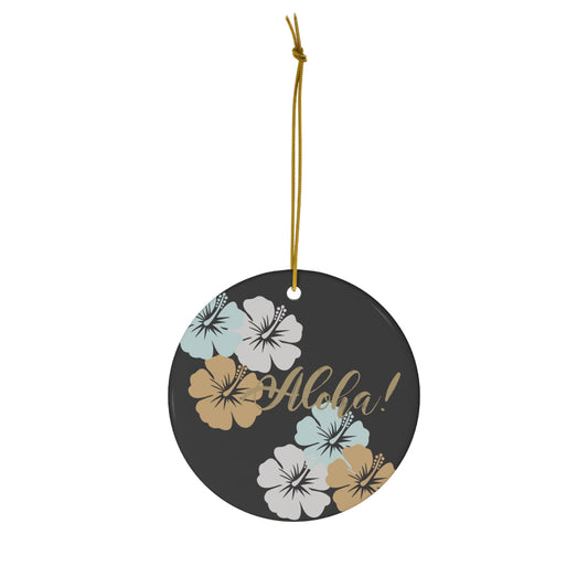 Charcoal ceramic ornament with gold Aloha lettering and blue, white and tan tropical hibiscus flowers.