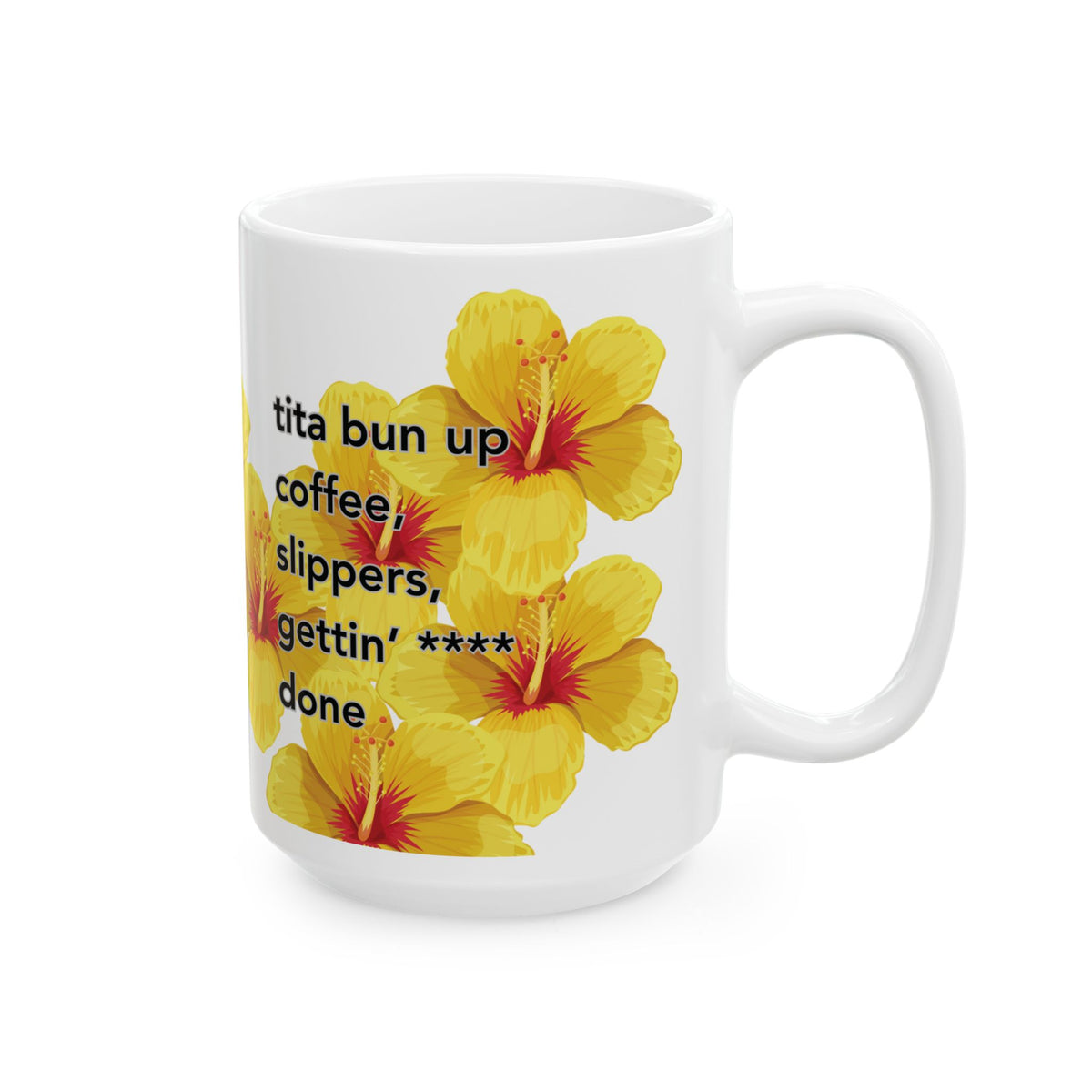 A white ceramic mug featuring a graphic print of yellow hibiscus flowers and the text 'tita bun up coffee, slippers, gettin' done' in black lettering, set against a plain white background.