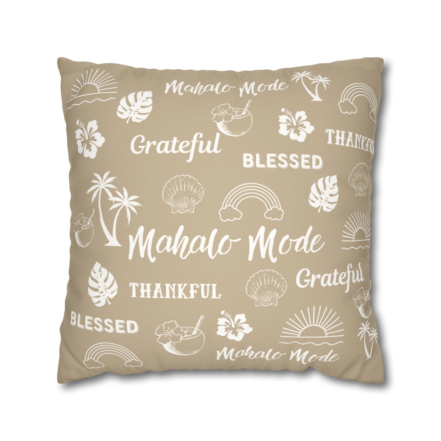 A square throw pillow in a warm beige color, printed with white tropical-themed illustrations and words including 'Mahalo Mode', 'Grateful', 'Blessed', and 'Thankful'.