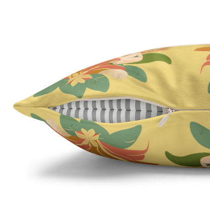 A close-up of a decorative throw pillow with a yellow base and a tropical floral pattern in green, orange, and cream. The pillow is shown slightly open, revealing a striped gray and white inner cushion, on a clean white background.