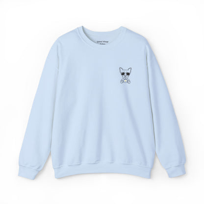 A light blue crewneck sweatshirt featuring a small graphic of a French Bulldog wearing sunglasses on the left chest, displayed on a clean white background.