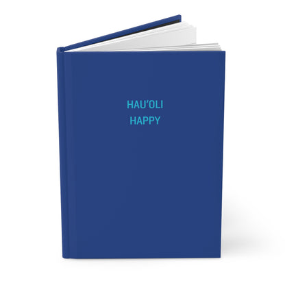 A hardcover notebook or journal with a solid blue cover, featuring the words 'HAU'OLI HAPPY' printed in light blue on the front cover, shown on a clean white background.