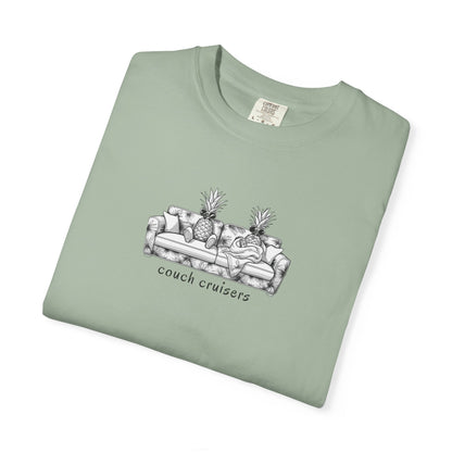 Folded Couch Cruisers graphic Comfort Colors tee in light green with pineapple couch design
