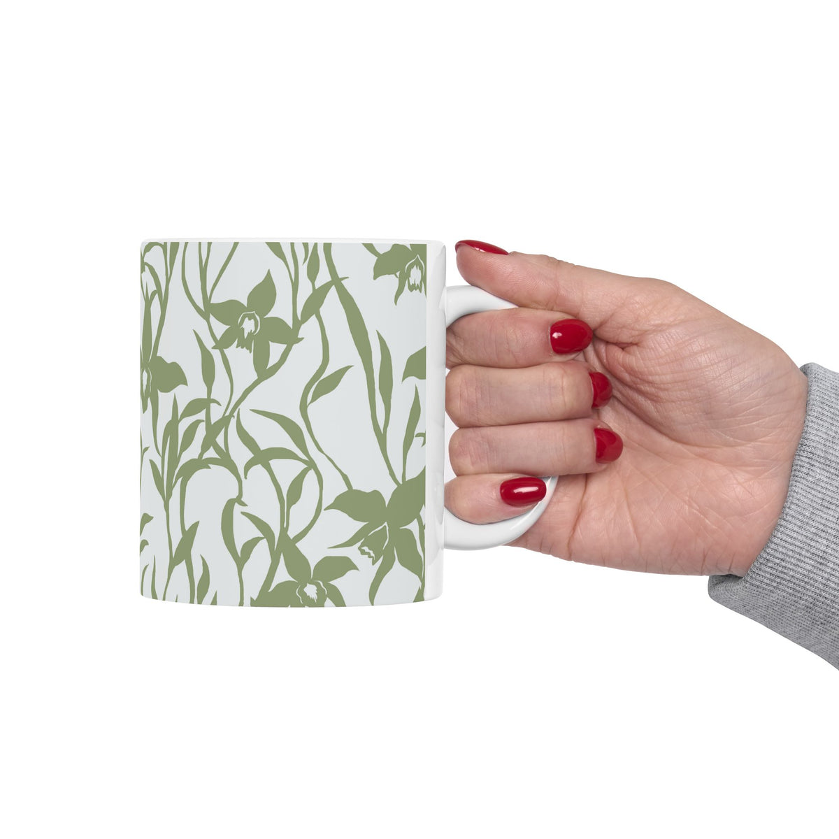 Woman holding mug Orchid Sage coffee mug with tropical orchid print by Global Village Kailua with white background.