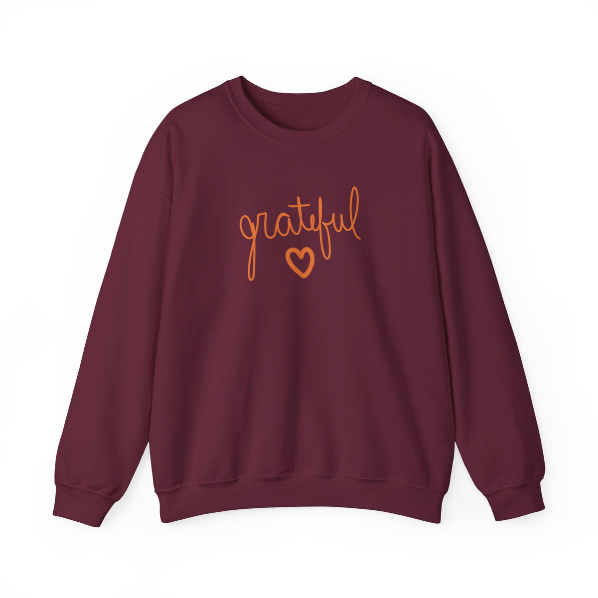 A maroon crewneck sweatshirt featuring the word 'grateful' in orange cursive script and a matching orange heart outline on the chest, displayed against a solid white background.