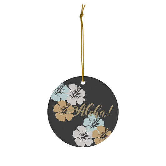 Charcoal ceramic ornament with gold Aloha lettering and blue, white and tan tropical hibiscus flowers.