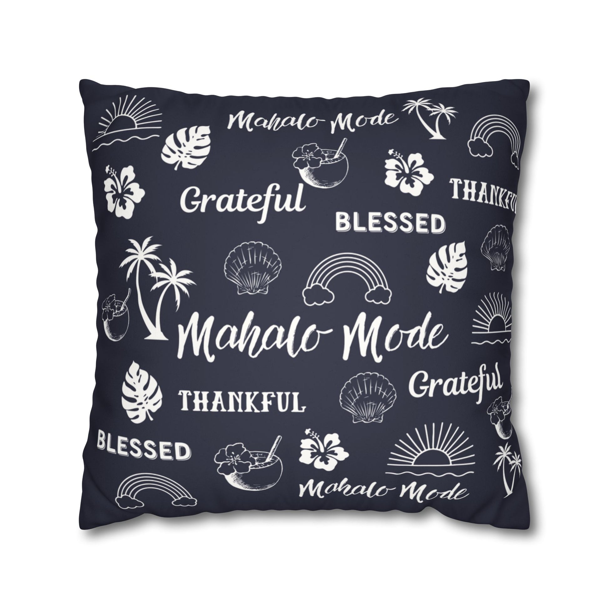 A square throw pillow in dark navy blue with a white tropical-themed print featuring the words 'Mahalo Mode', 'Grateful', 'Blessed', and 'Thankful' alongside palm trees, hibiscus flowers, seashells, rainbows, and sunsets.