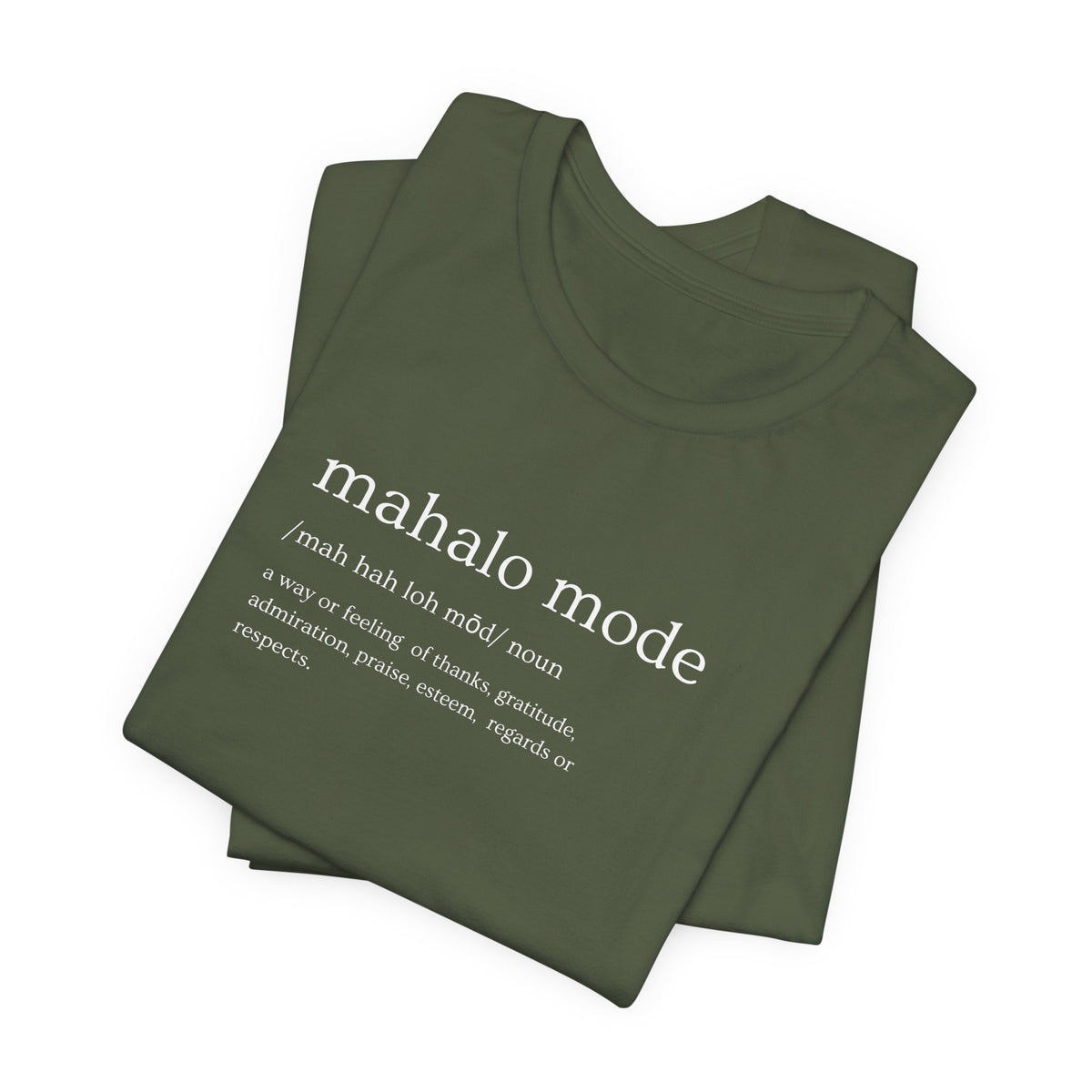A folded olive t-shirt with a white printed dictionary-style definition of 'mahalo mode' on the chest, shown against a plain white background.