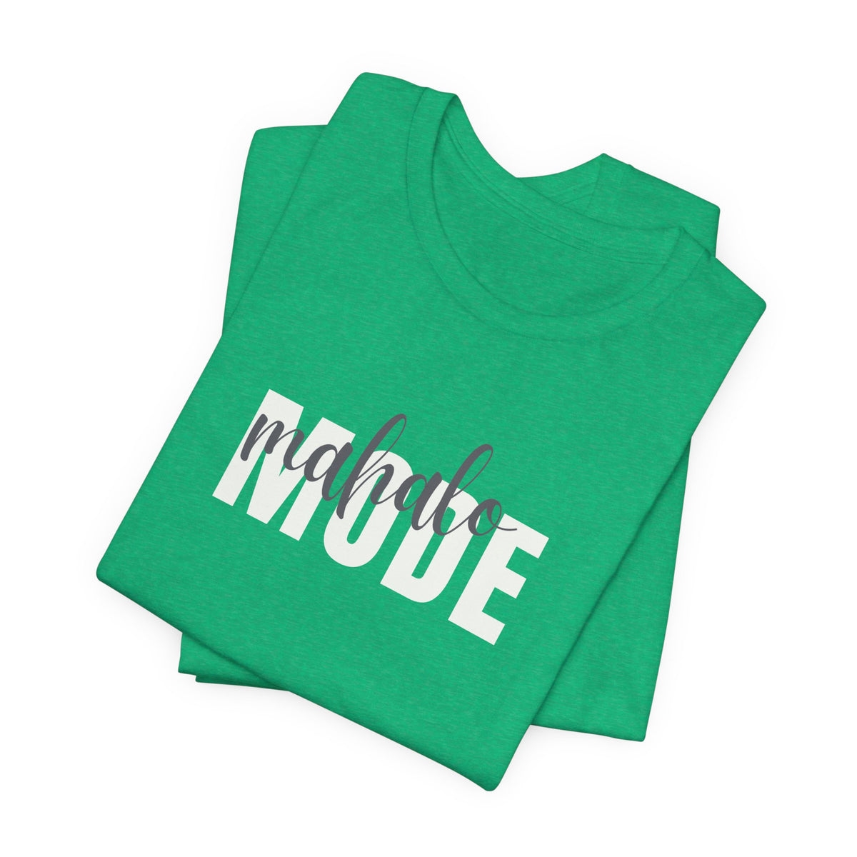 A folded green t-shirt with 'MAHALO MODE' printed in bold white letters and a gray script overlay reading 'mahalo', set against a plain white background.