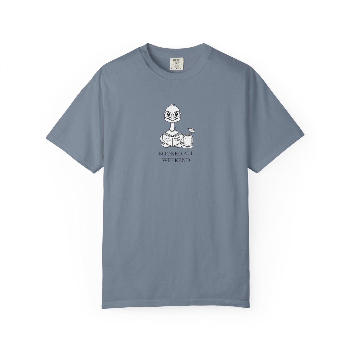 A dusty blue comfort colors t-shirt with design of a nene goose reading a book and text 'booked all weekend' 