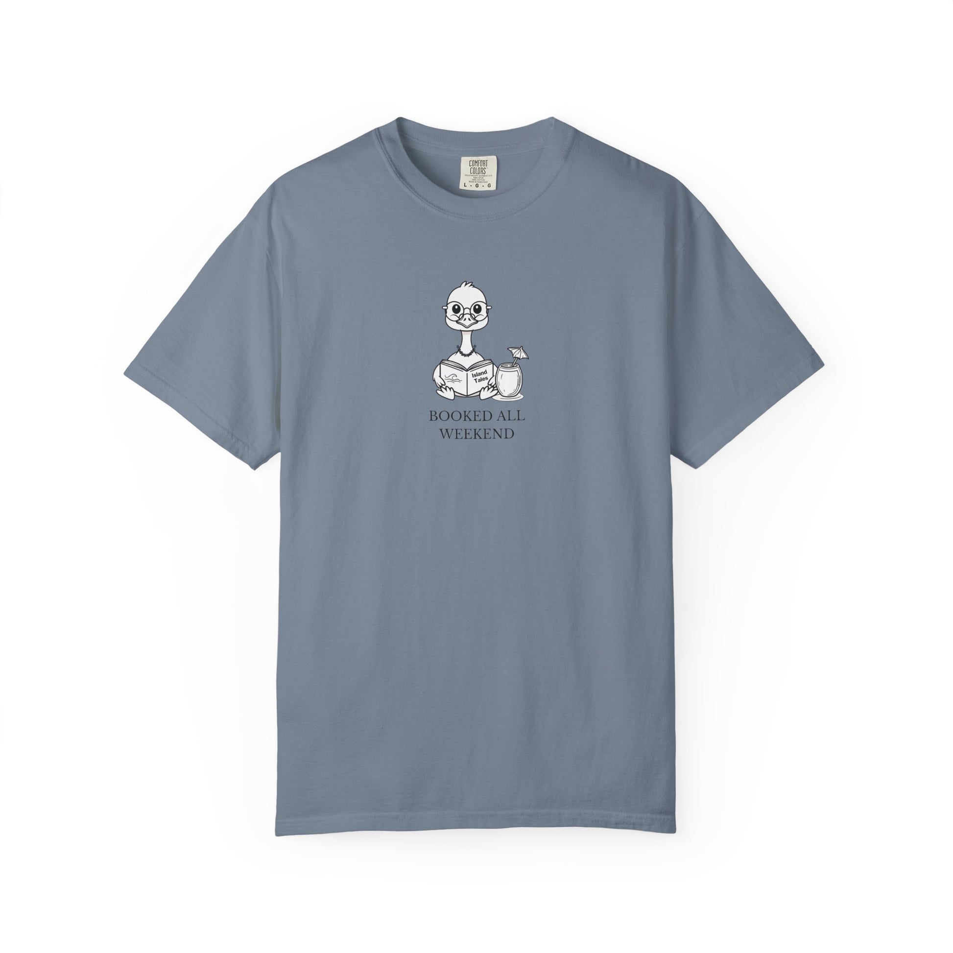 A dusty blue comfort colors t-shirt with design of a nene goose reading a book and text 'booked all weekend' 