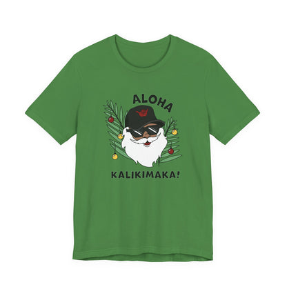 Leaf Green Santa Kalikimaka unisex T-shirt with hand-drawn Santa wearing sunglasses and throwing a shaka surrounded by tropical palm leaves.