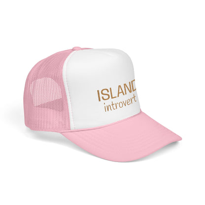 A pink and white trucker hat with gold text reading 'ISLAND introvert' on the front panel, shown on a clean white background.