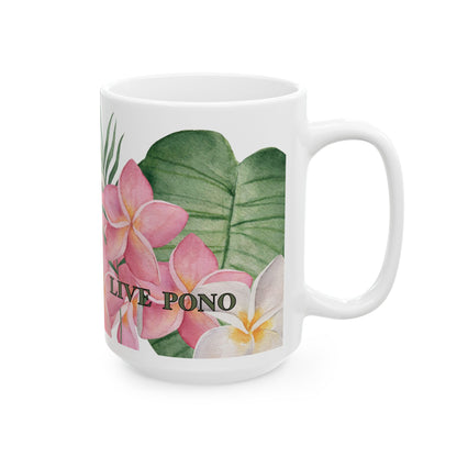 A white ceramic mug featuring a tropical watercolor design with pink plumeria flowers, green leaves, and the text 'LIVE PONO'.
