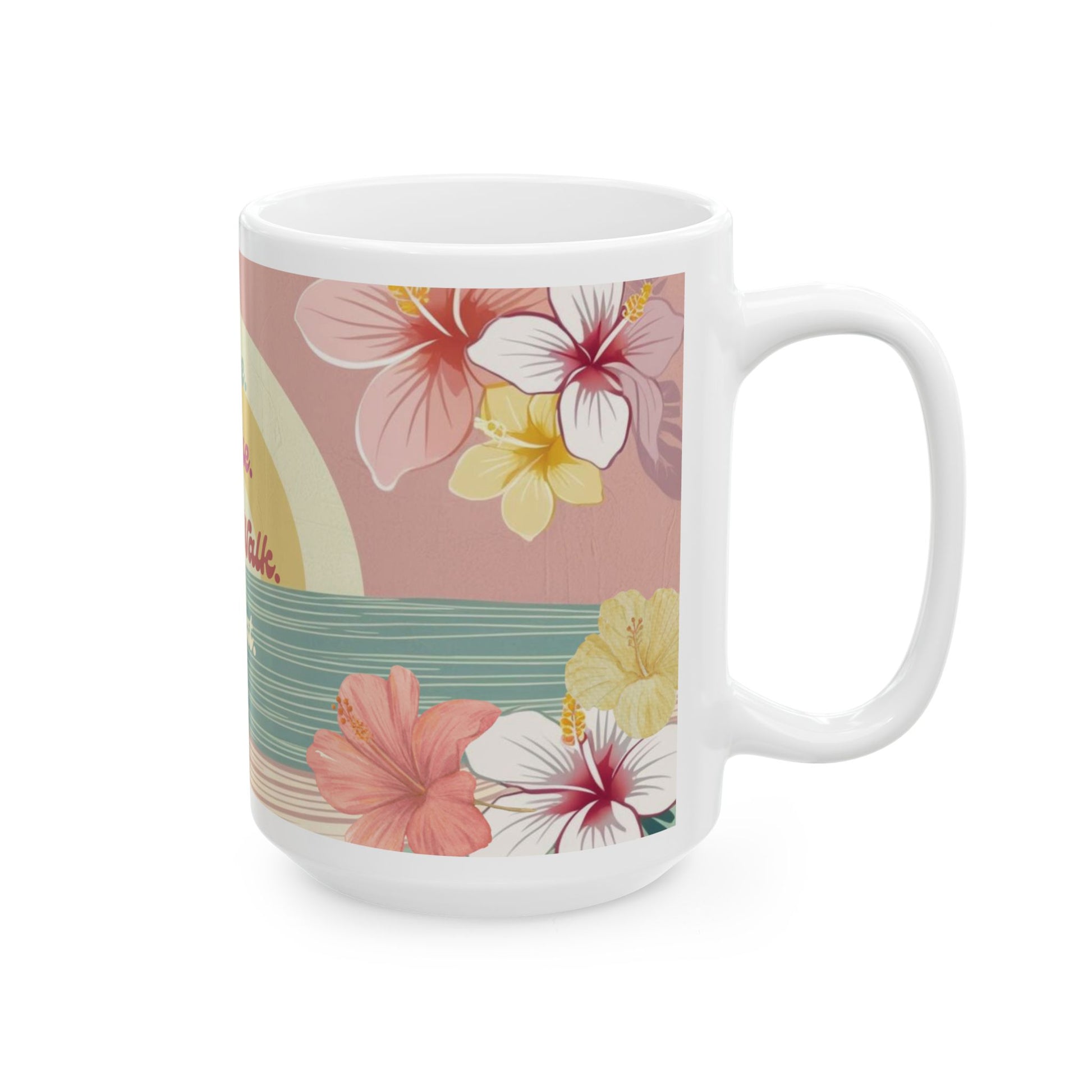 A white ceramic mug featuring a retro-style tropical floral print with hibiscus flowers and a sun on a dusty pink background, shown against a plain white studio backdrop.