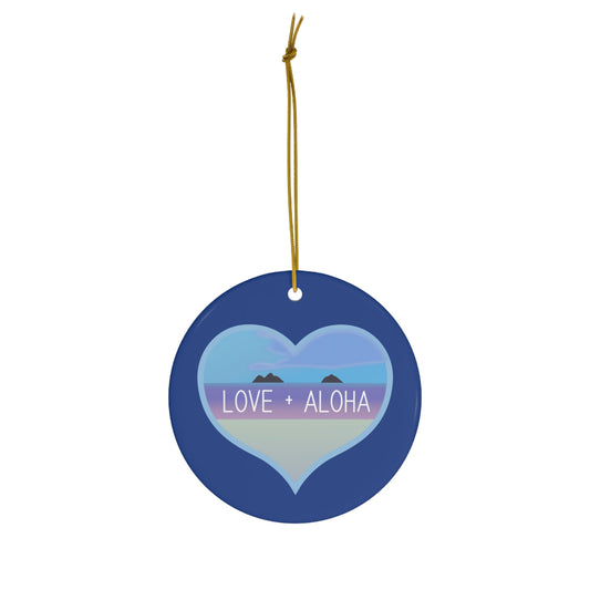 Blue ceramic ornament with heart-shaped Kailua ocean scene, Mokulua islands and Love + Aloha lettering.