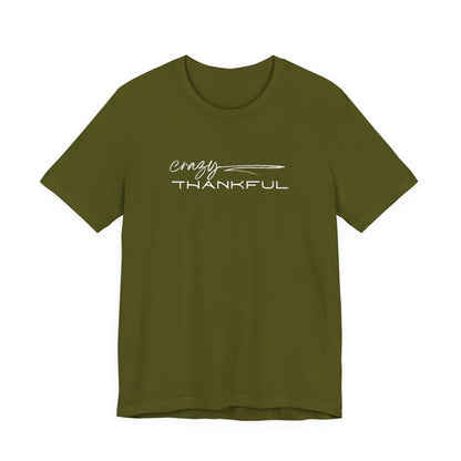 Olive Crazy Thankful graphic t-shirt by Global Village Kailua