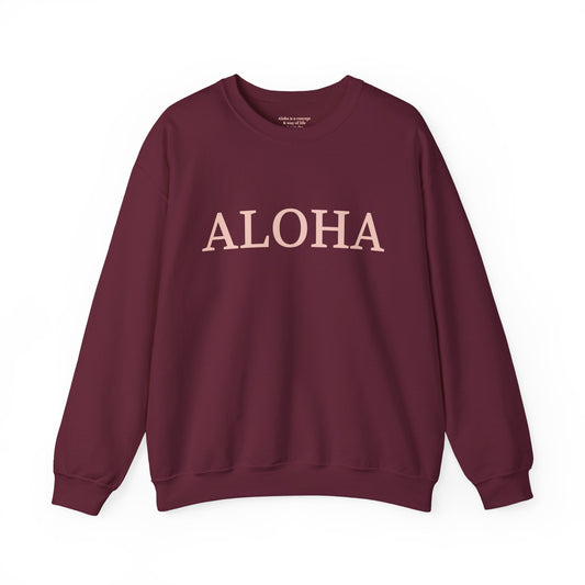 Maroon sweatshirt with text 'ALOHA' in light pink