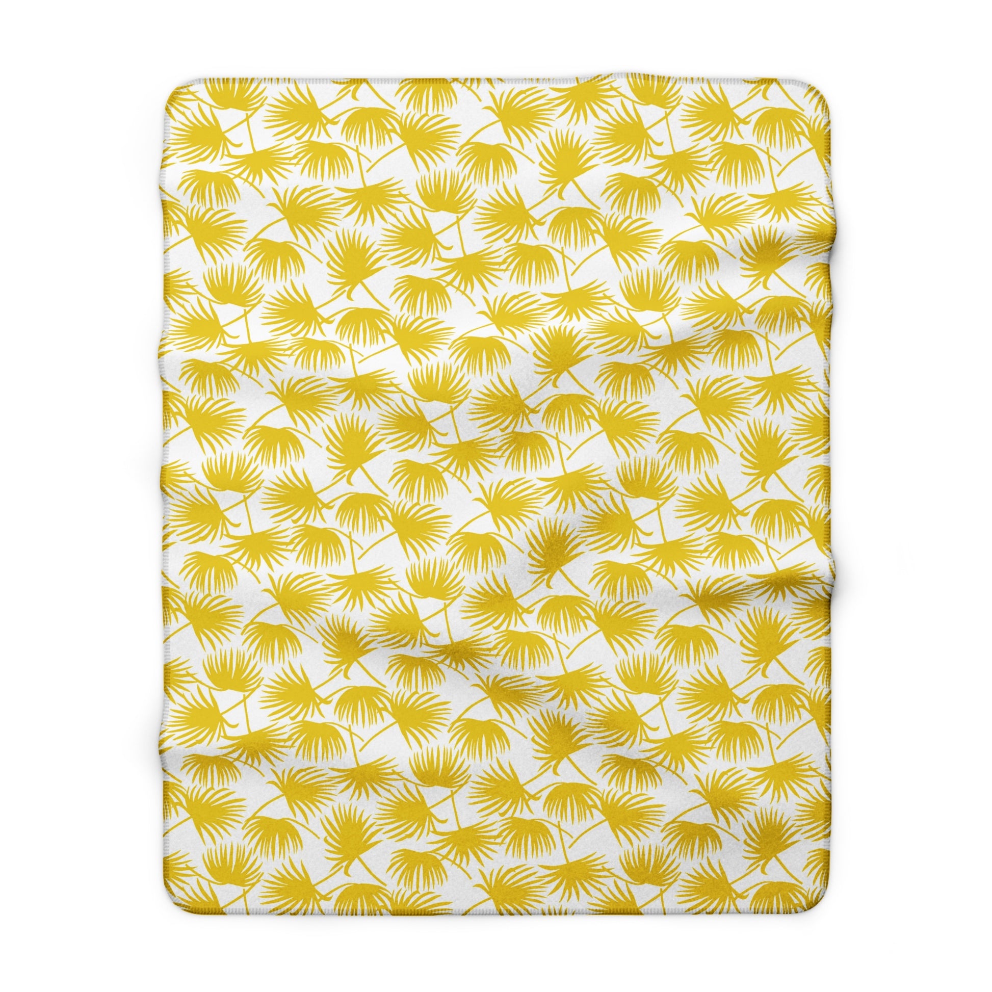 A rectangular throw fleece blanket, featuring a repeating pattern of yellow palm fronds on a white background.