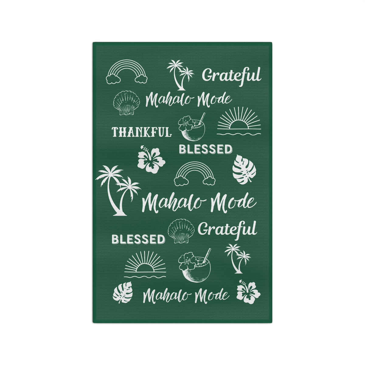 A dark green kitchen towel with white tropical-themed illustrations and repeated phrases including 'Grateful Mahalo Mode,' 'THANKFUL,' 'BLESSED,' and 'Mahalo Mode.'.