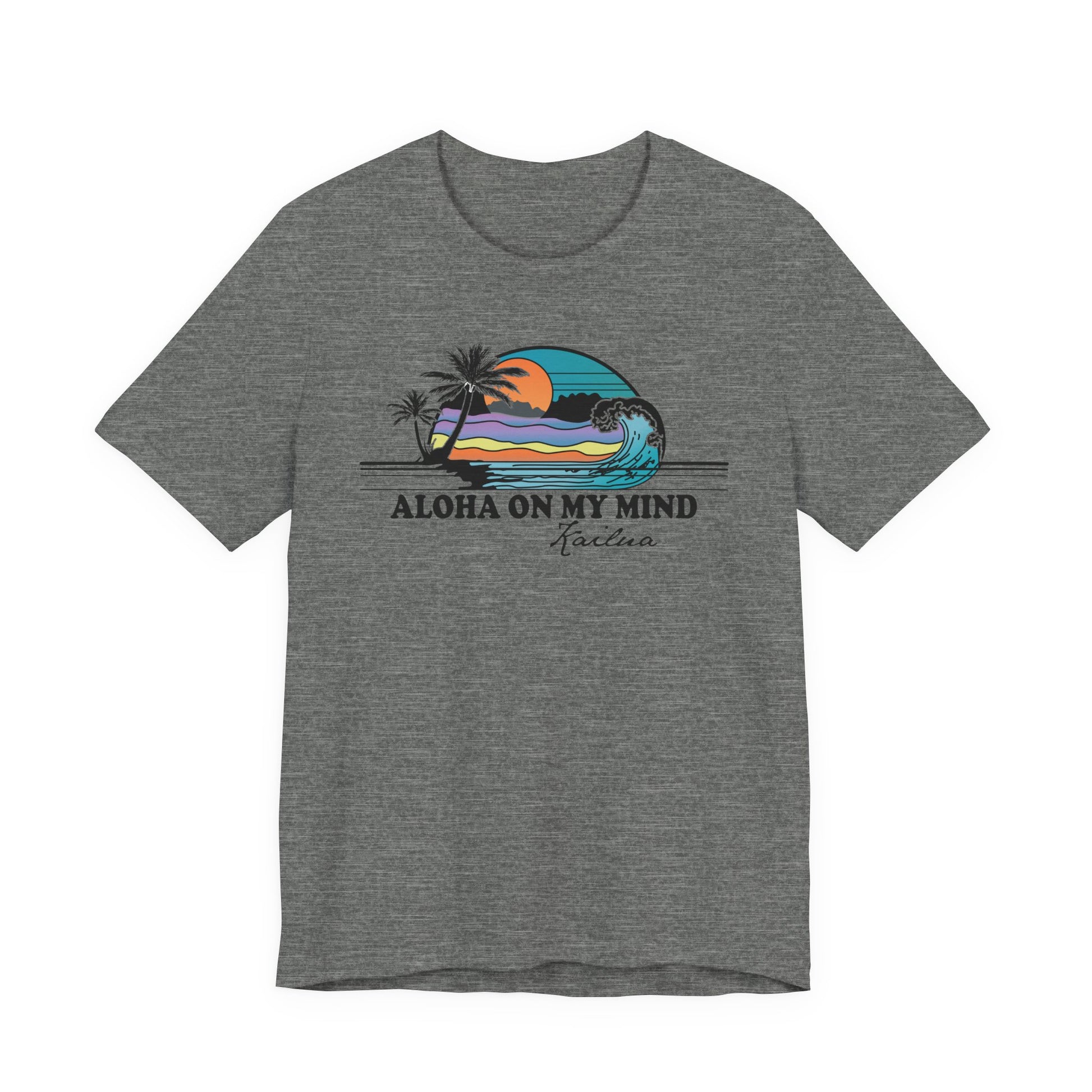 A heather gray short-sleeve t-shirt with a colorful graphic of a surfboard in a sunset scene and the text 'ALOHA ON MY MIND' and 'Kailua' printed on the chest, displayed against a solid white background.