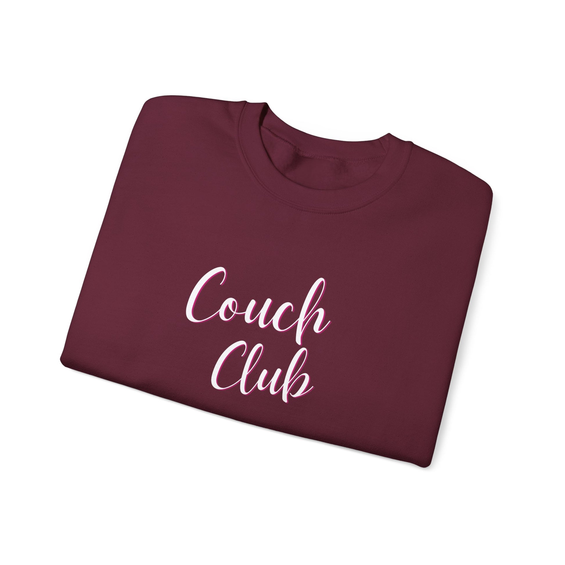 Folded maroon sweatshirt with a graphic design text 'Couch Club' in script.