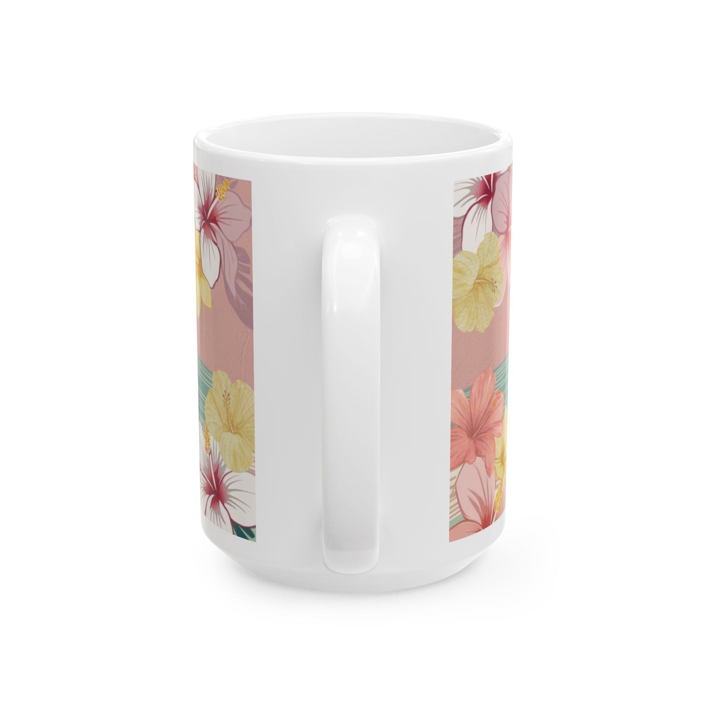 A white ceramic mug featuring a tropical floral print with pink, yellow, and red hibiscus flowers on a dusty pink background, shown from a side angle against a white studio background.