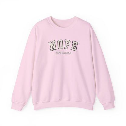 A light pink crewneck sweatshirt with the words 'NOPE NOT TODAY' printed on the chest in a varsity-style font.