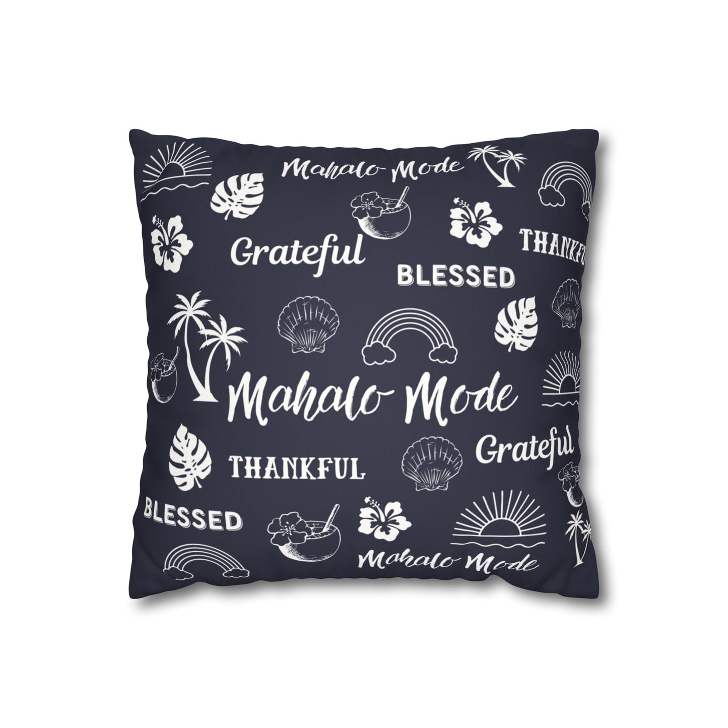 A square throw pillow in dark navy blue with a white tropical-themed print featuring palm trees, monstera leaves, seashells, rainbows, hibiscus flowers, and words like 'Mahalo Mode', 'Grateful', and 'Thankful'.