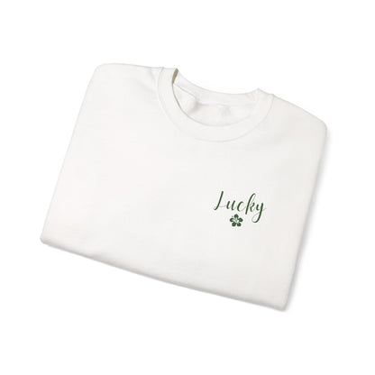 White sweatshirt with 'Lucky' and a clover leaf on a white background