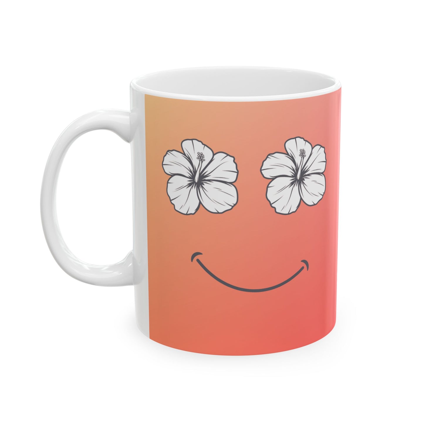 A white ceramic mug featuring a printed design with a peach-to-pink gradient background, white hibiscus flower eyes, and a black smiley mouth.