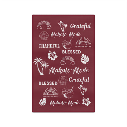 Burgundy Mahalo Mode kitchen towel with thankful grateful blessed and tropical island motifs