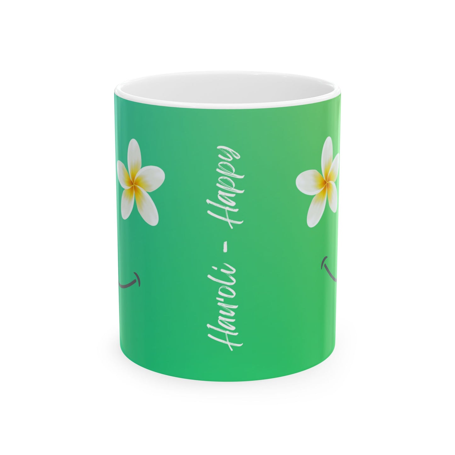 A green ceramic mug with a white interior, decorated with two white plumeria flowers and the words 'Hauʻoli - Happy' in white script.