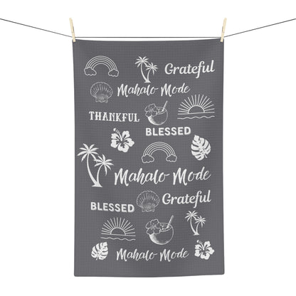 Grey Mahalo Mode kitchen towel with thankful grateful blessed and tropical island motifs