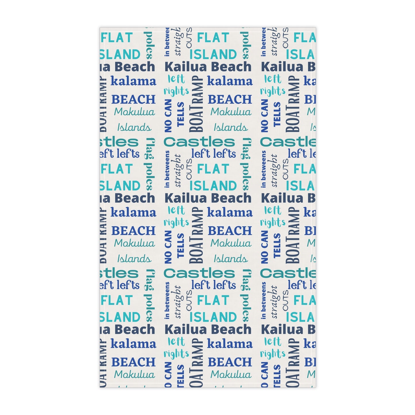 A tea towel featuring a repeating pattern of words like 'FLAT ISLAND', 'CASTLES', 'KALAMA BEACH', 'Kailua Beach', 'BOAT RAMP', and 'MOKOLUA ISLANDS' in blue, teal, and navy on a white background.