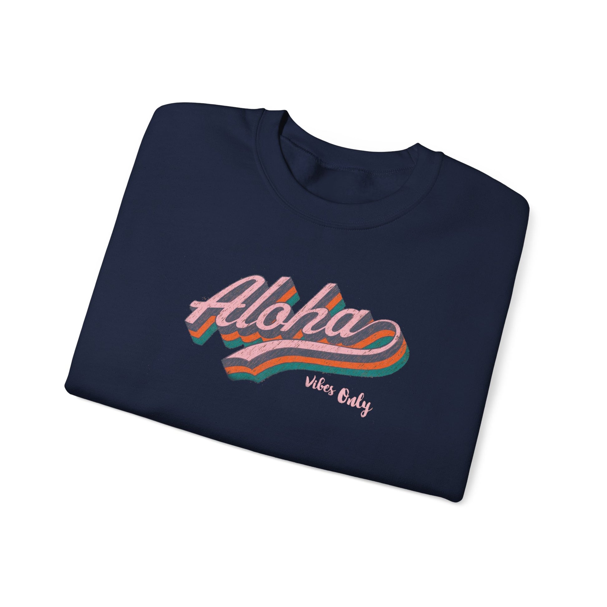 A navy blue folded t-shirt with a retro-style 'Aloha Vibe Only' graphic on the chest, displayed on a clean white background.