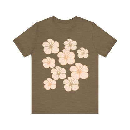 Olive Hibiscus All Over Graphic Tee featuring scattered tropical hibiscus flowers on a soft unisex tee inspired by island life in Hawaii.