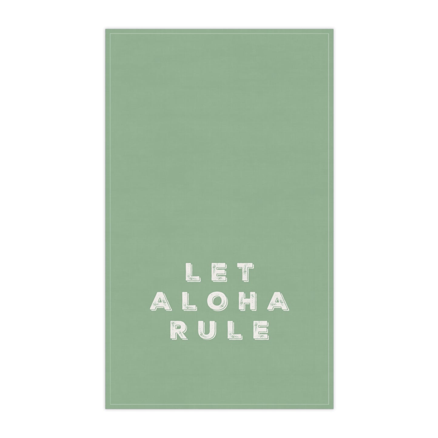 A rectangular sage green tea towel with the phrase 'LET ALOHA RULE' printed in white block letters near the bottom center, shown against a plain white background.