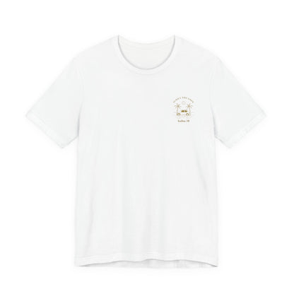 A white short-sleeve t-shirt shown from the front, featuring a gold-colored retro graphic of a classic car between two palm trees with the text 'ALOHA DREAMIN'' and 'Kailua, HI' on the left chest.