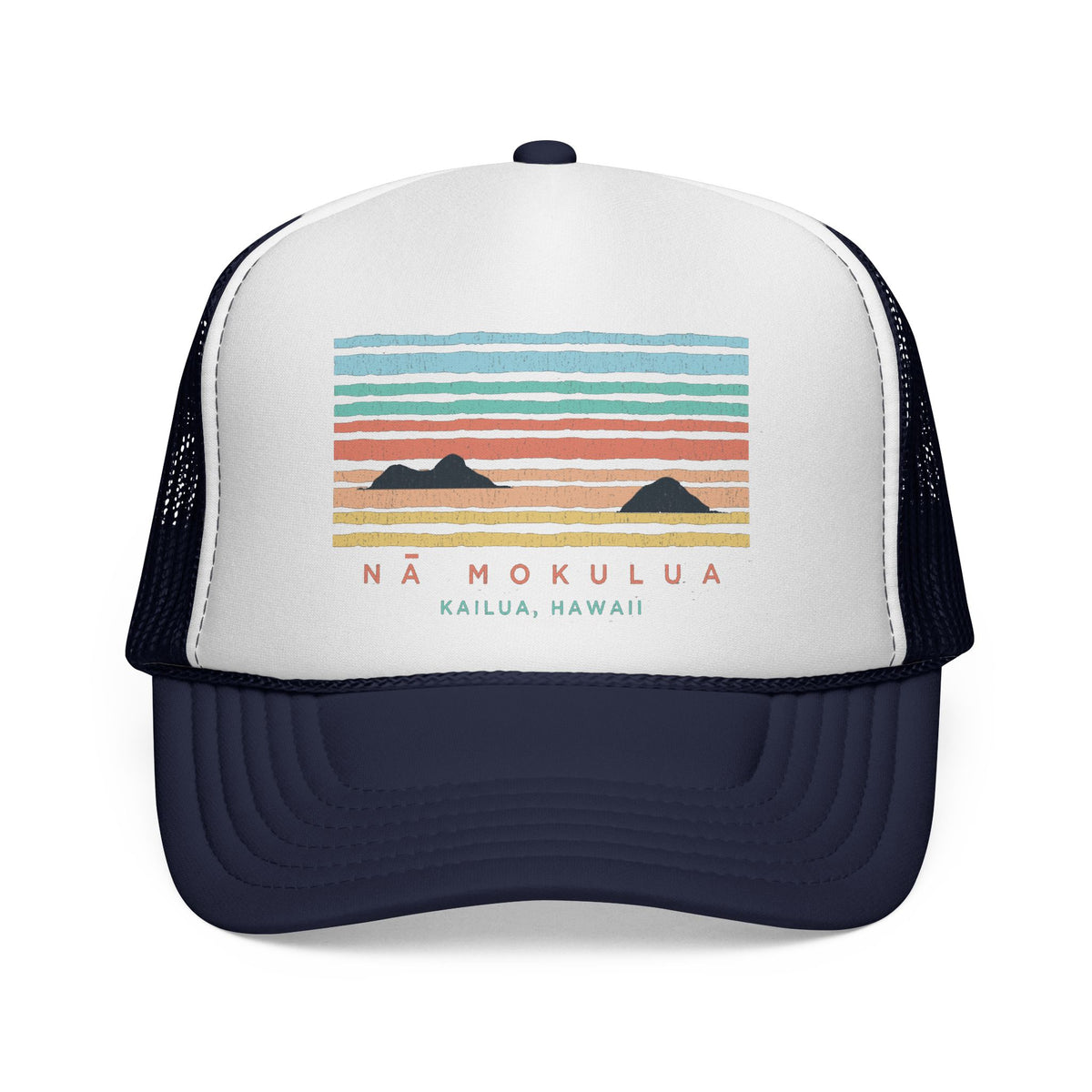 A white and navy blue trucker hat featuring a colorful graphic of a sunset over mountains with the text 'NÁ MOKULUA' and 'KAILUA, HAWAII'.
