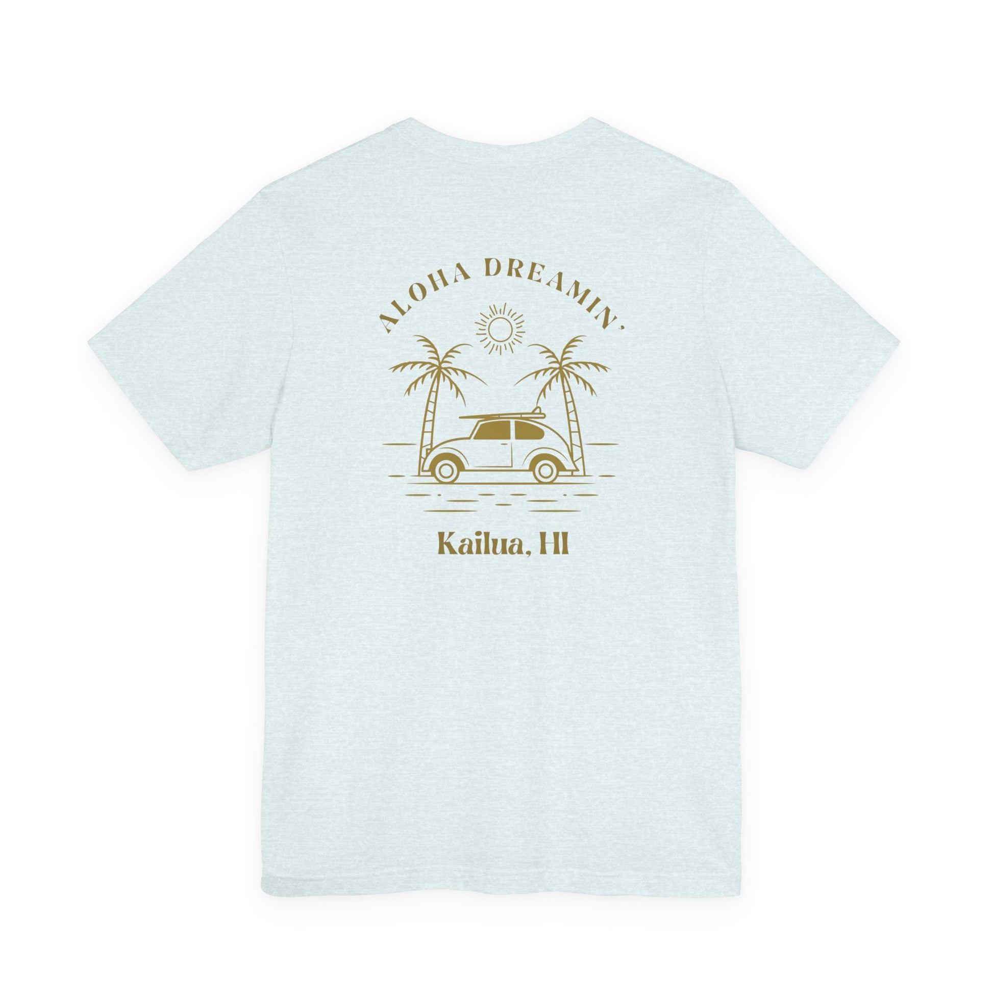 A light heather blue short-sleeve t-shirt shown from the back, featuring a retro-style tan graphic of a car between two palm trees with the text 'ALOHA DREAMIN'' and 'Kailua, HI'.