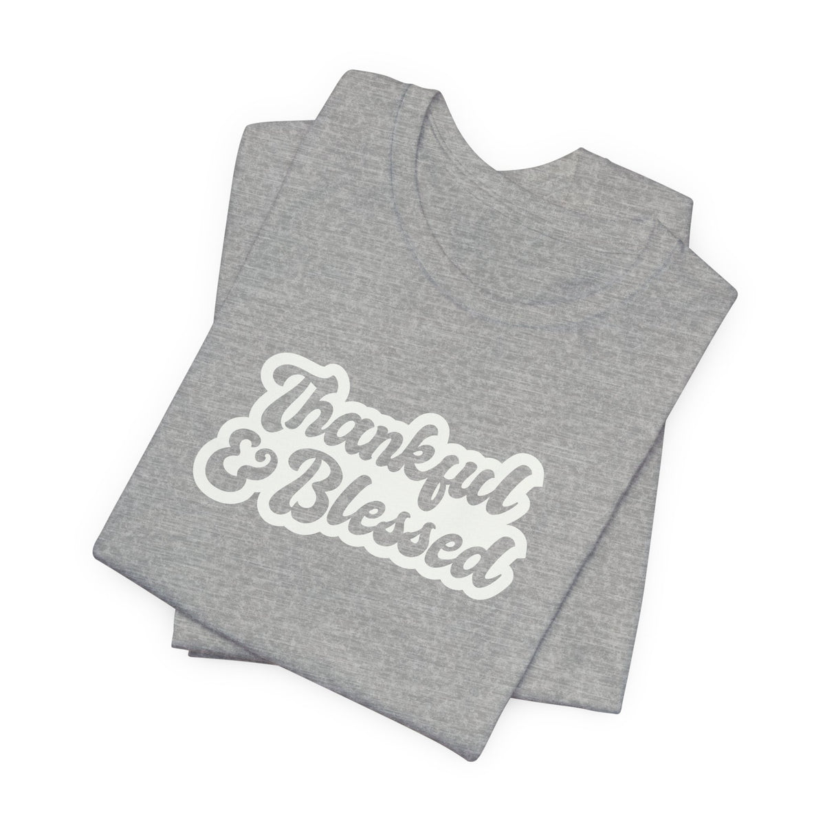 A folded athletic heather t-shirt with 'Thankful & Blessed' printed in a white and brown retro-style font, displayed on a clean white background.