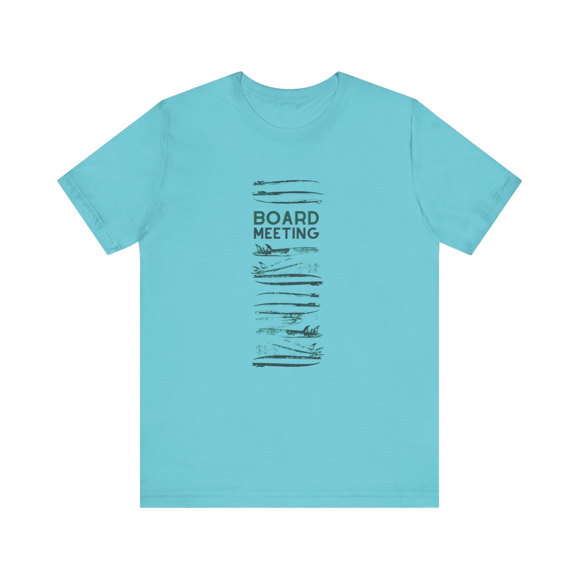 A light blue short-sleeve crewneck t-shirt with a vertical graphic on the front featuring the words 'BOARD MEETING' in dark gray text surrounded by surfboards, displayed on a solid white background.