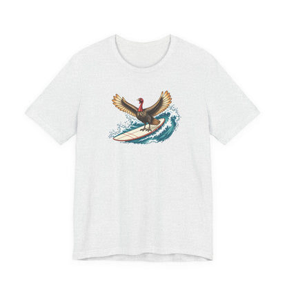 Ash color surfing turkey Thanksgiving T-shirt featuring a teal wave and vintage-inspired island artwork.