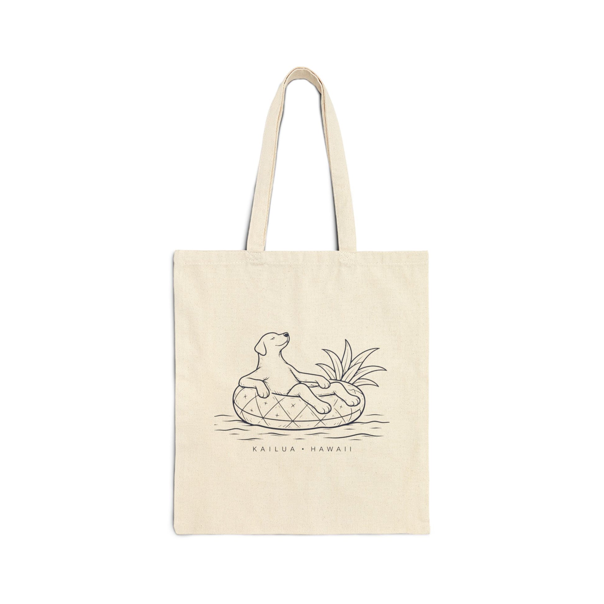 Beige tote bag with a dog and surfboard design on a white background