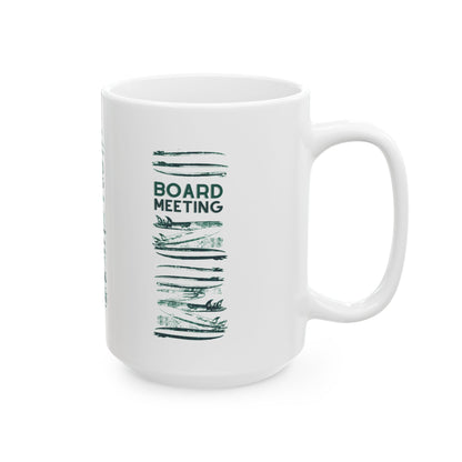 A white ceramic mug 15 oz with a green printed graphic featuring the text 'BOARD MEETING' and horizontal brushstroke details, shown on a plain white background.