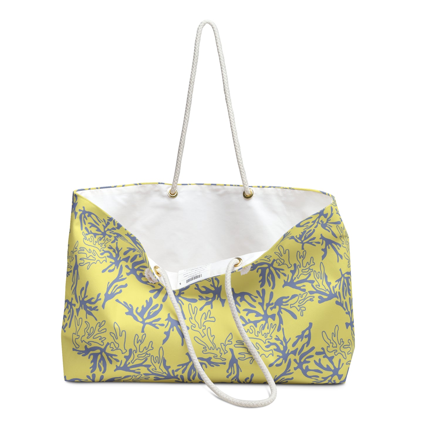 A yellow canvas tote bag with a sea coral pattern, featuring a white rope handle and a white inner lining, shown against a plain white background.