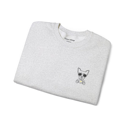 Folded grey sweatshirt with an embroidered dog drinking a cup of coffee on a white background