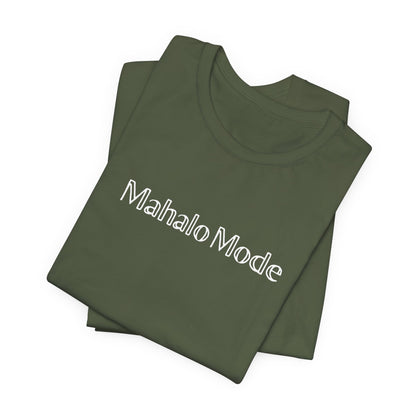 A folded Mahalo Mode graphic tee in military green with white outlined lettering, Global Village Kailua original design.